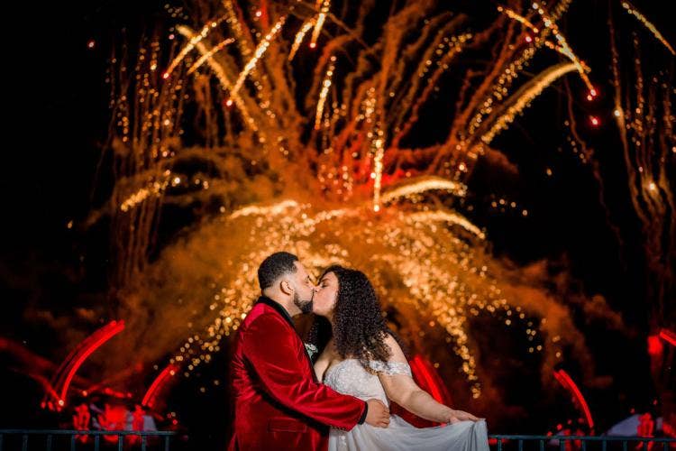 bride and groom, couple, portrait, couple portrait, kiss, couple kiss, fireworks dessert party, dessert party, fireworks, candid, diversity, epcot