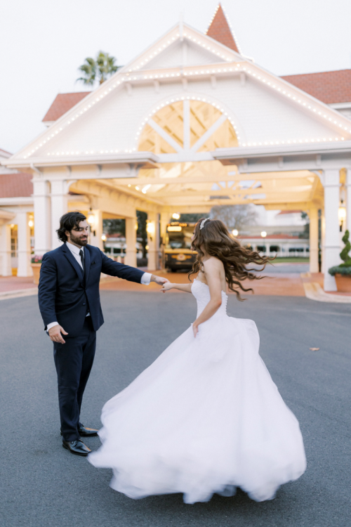 bride and groom, bride and groom dancing, grand floridian resort, classic fairy tale wedding, bride and groom spin, bride and groom dance