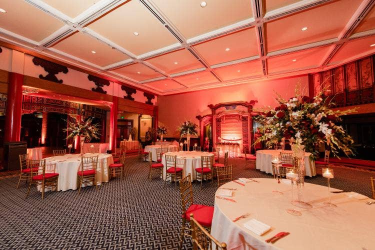 decorated wedding reception, wedding reception, reception, venue shot, china pavilion, Epcot, great hall of china, custom up lighting, up lighting, red up lighting