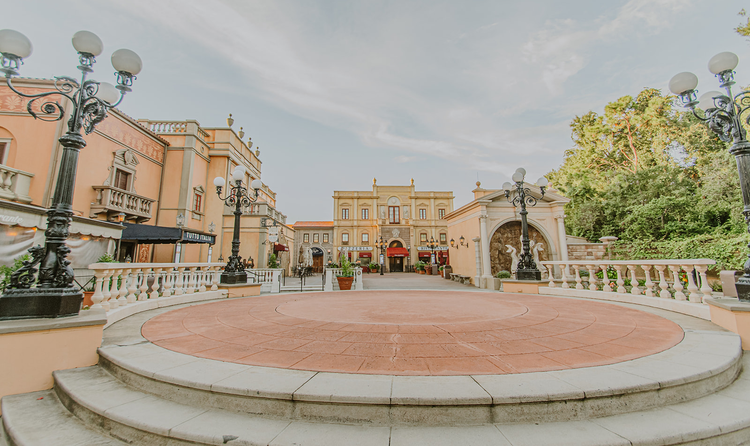 A terrace at the center of the Italy Pavilion in EPCOT featuring recreations of Venetian buildings