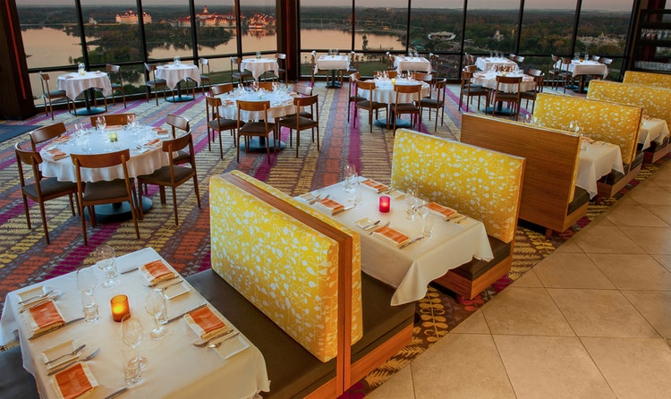 The dining room at California Grill in Disney’s Contemporary Resort with views of Seven Seas Lagoon