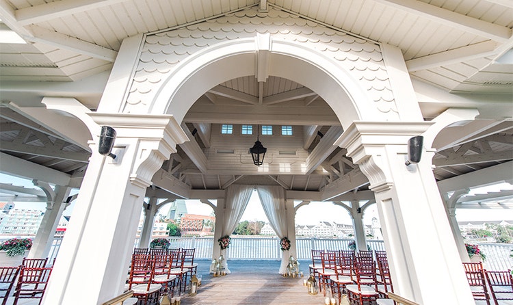 A large archway leading to an aisle on a deck