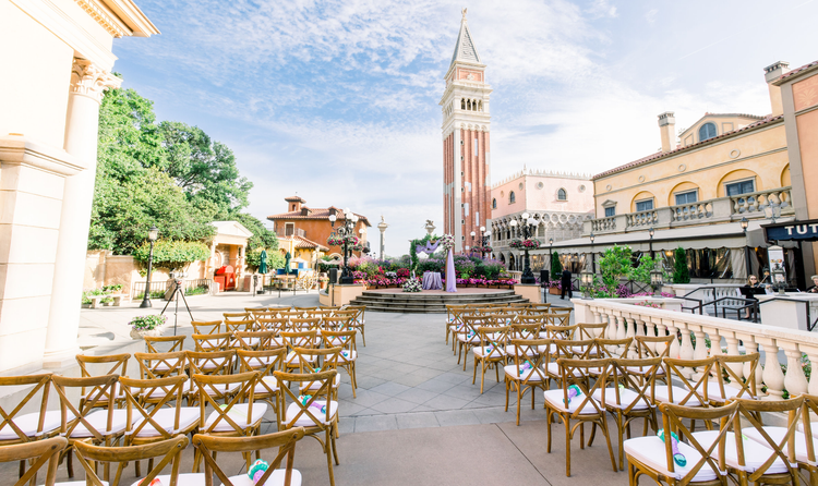 Chairs lined up along an aisle leading to a terrace at the center of the Italy Pavilion in EPCOT