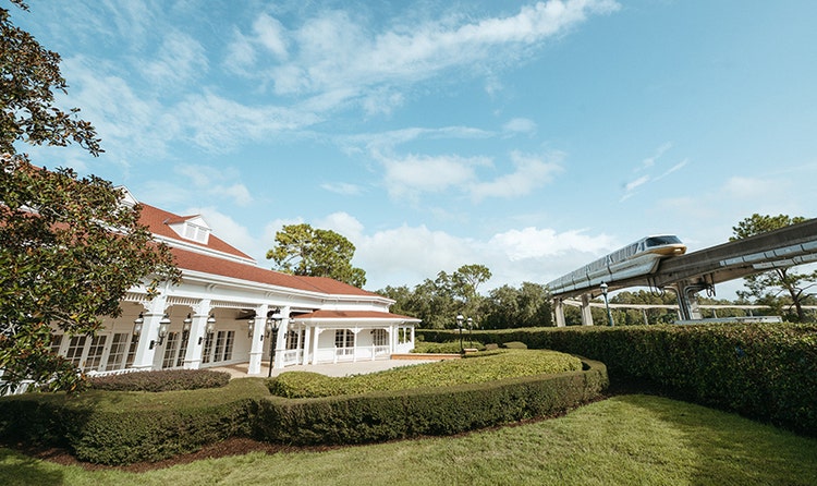 The Resort monorail traveling by one of the gardens at Disney's Grand Floridian Convention Center