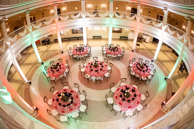 The first floor of the rotunda is set with decorations and tables for a reception in the center of the room