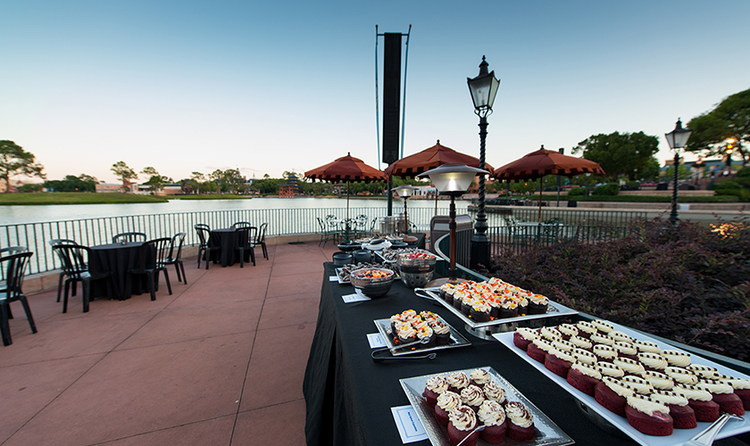 The dessert table of a lakeside buffet in World Showcase at EPCOT.
