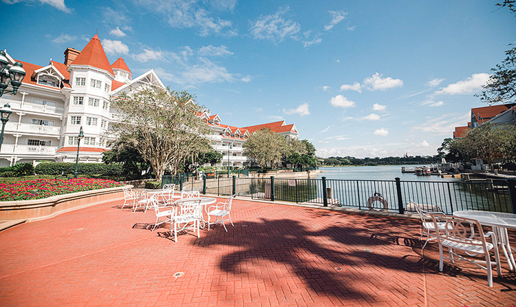 Disney’s Grand Floridian Resort and Spa, a large flower bed and large brick patio that overlooks the marina