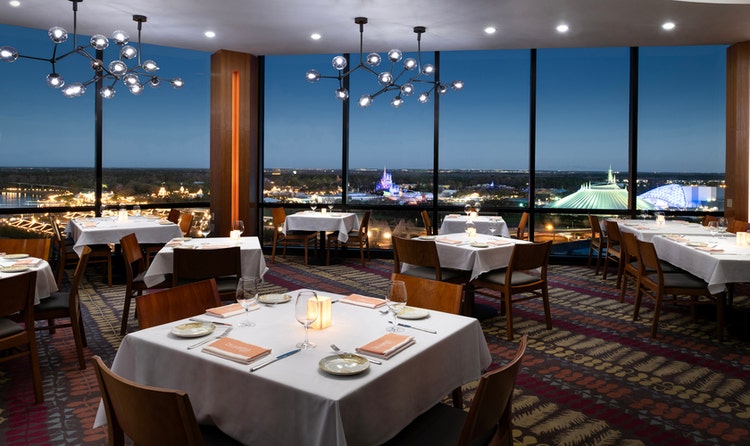 The dining room at California Grill in Disney’s Contemporary Resort with views of Magic Kingdom park