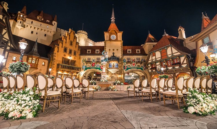 Chairs and flowers arranged for a wedding ceremony in the Germany pavilion
