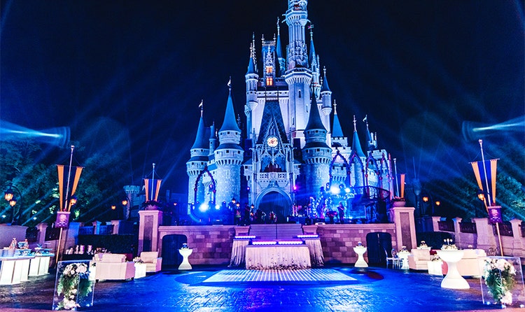 A dance floor is set up in front of Cinderella Castle in Magic Kingdom park