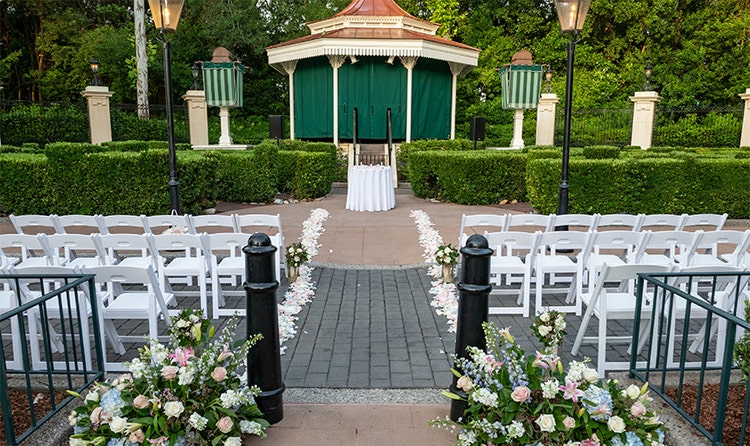 A pavilion with chairs and flowers at the United Kingdom Courtyard at Epcot