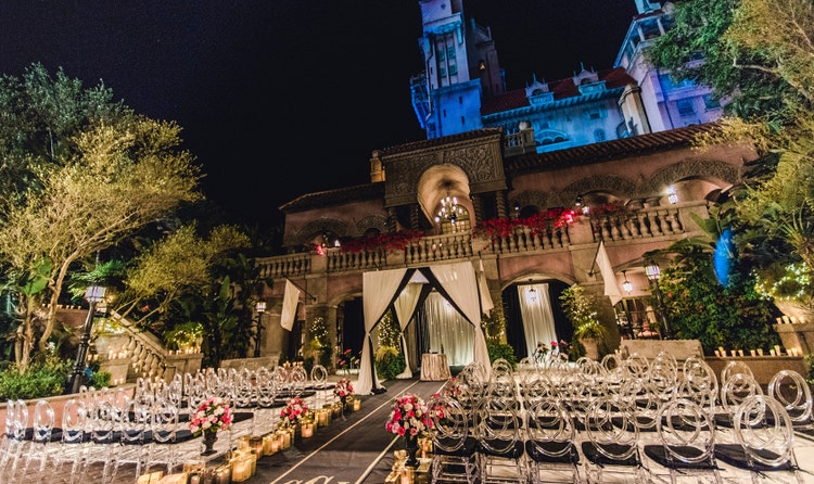 Chairs, flowers and an altar set up in front of the Hollywood Tower Hotel