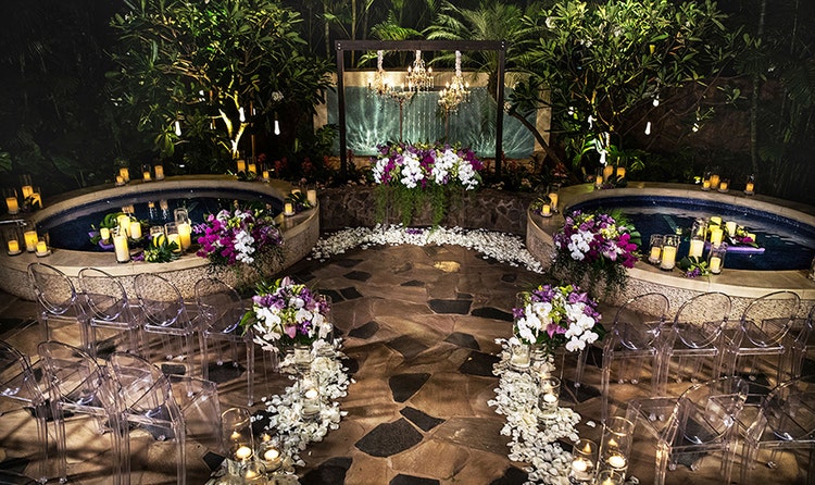 An altar in between 2 hot tubs lit with