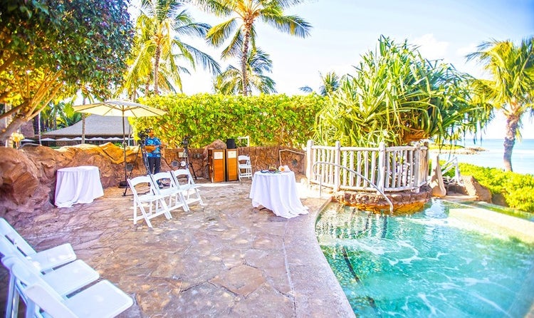 Alohi Point at Aulani, A Disney Resort and Spa featuring chairs set up in front of a pool