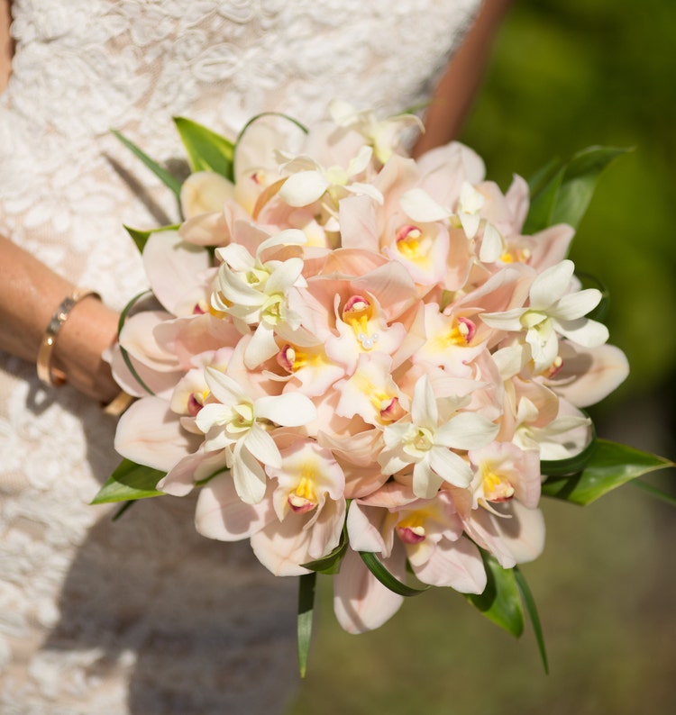 A woman holding a bouquet of flowers