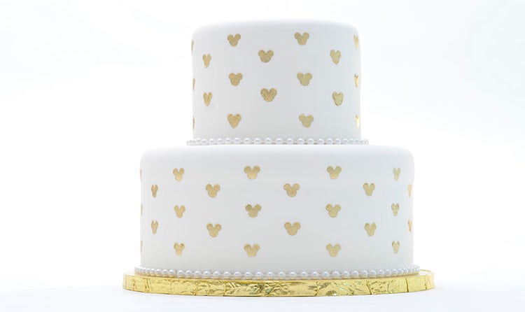 Mickey Mouse shapes on a 2 tier wedding cake