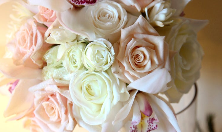 Pink and and wite roses with white orchids bouquet