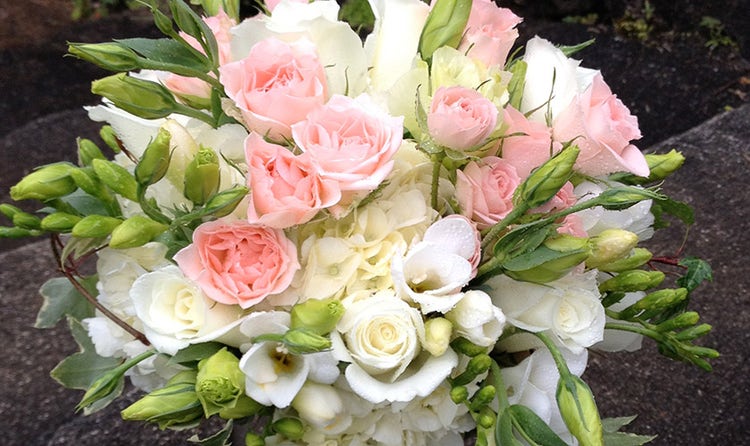 Mixed pink and white rose and hydrangea bouquet