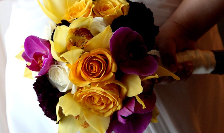 Mixed orange, gold and purple bridal bouquet